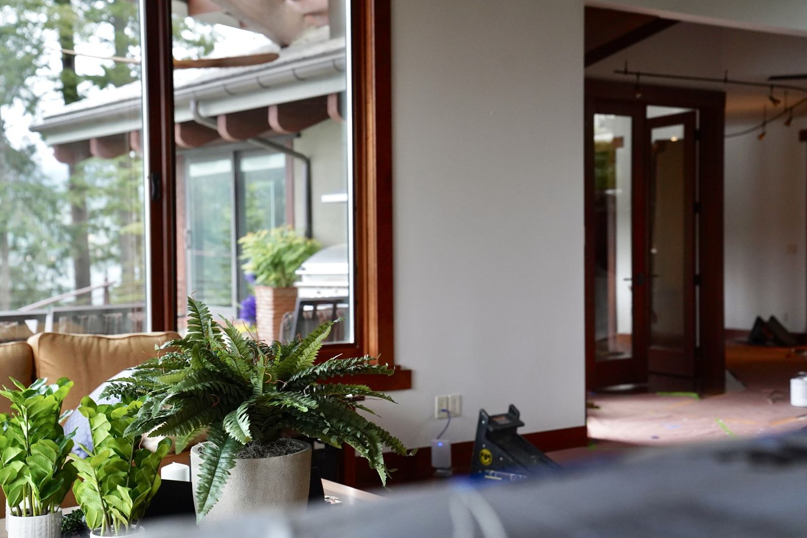A finished interior with white walls and wood trim